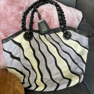 AUTHENTIC PRADA TOTE BAG black,white and purple with black chain. USED CONDITIO